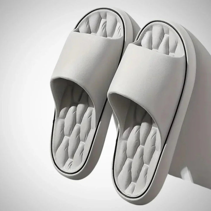 Cushioned men's slip-on sliders, ideal for summer beach or casual wear, offering ultimate comfort & support.