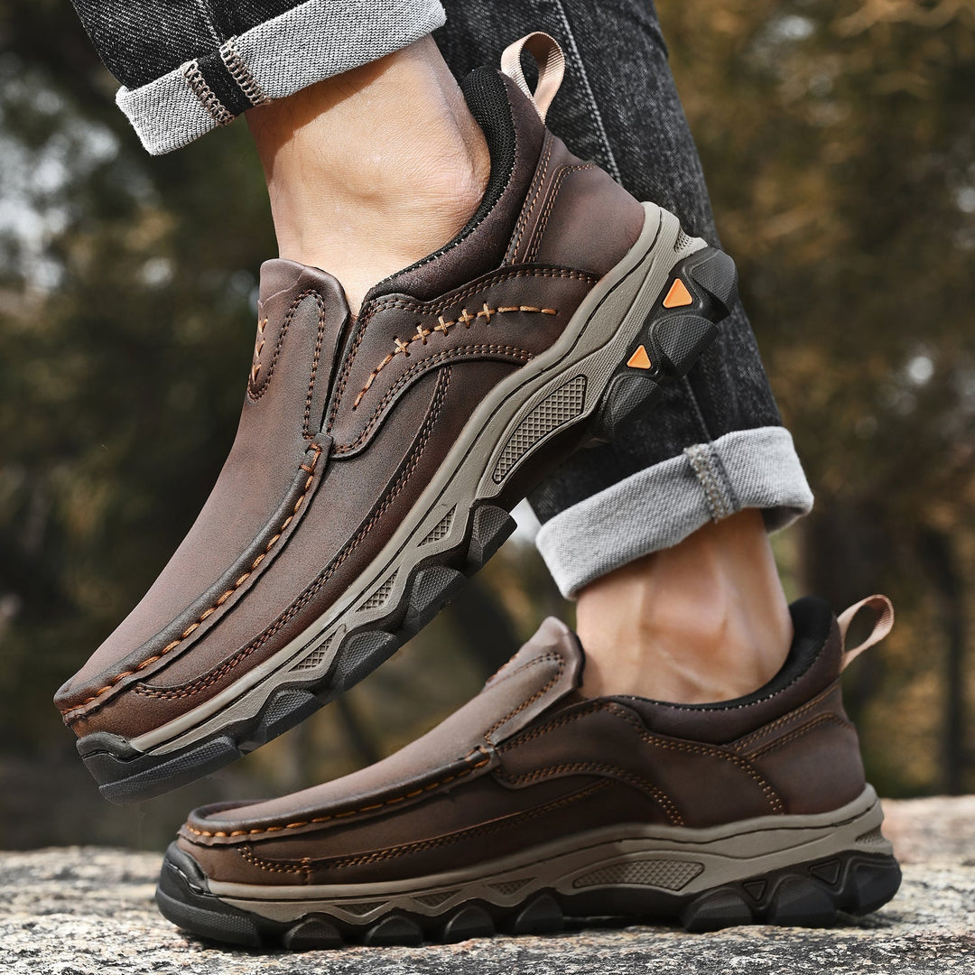 Men's slip-on walking shoes offering orthopedic comfort, arch support, & pain relief.