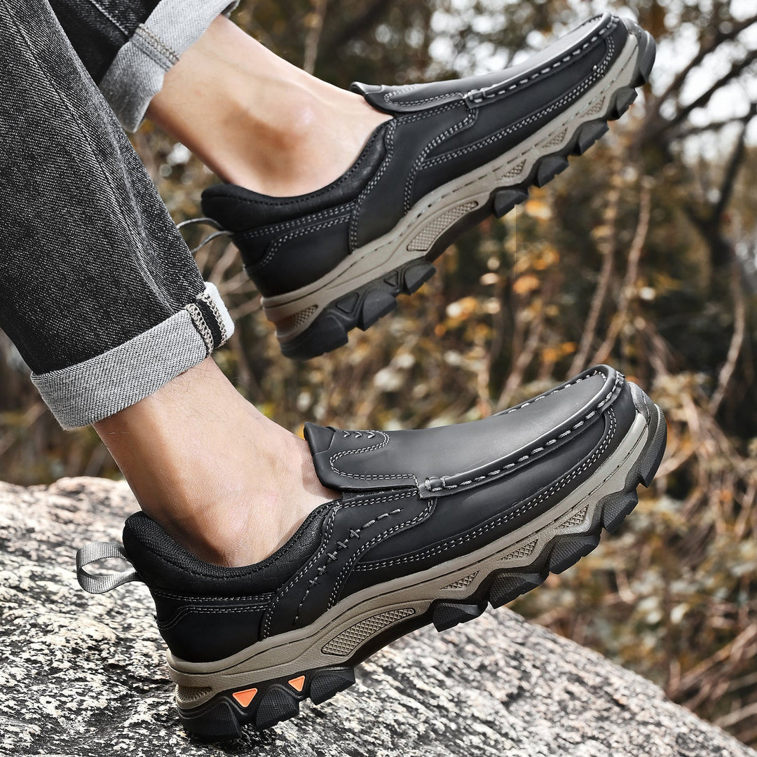 Supportive men's casual slip-on shoes, orthopedic features for walking comfort.
