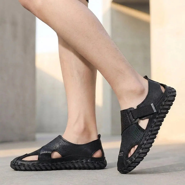 Comfortable men's walking sandals with closed-toe fisherman style, breathable & adjustable for foot support.