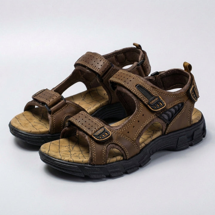 Close-up of men's perforated breathable orthopedic sandals, highlighting adjustable straps & comfortable sole.
