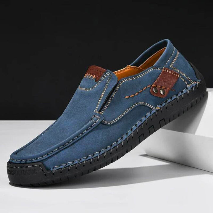 Brown men's slip-on orthopedic shoes with strong arch support, designed for comfortable walking.