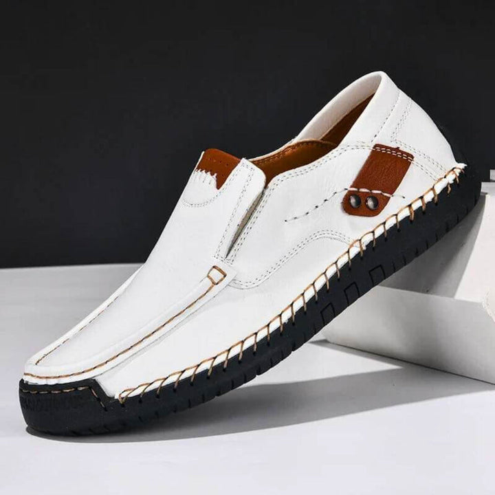 Durable men's slip-on shoes with orthopedic arch support, engineered for all-day comfort & stability.