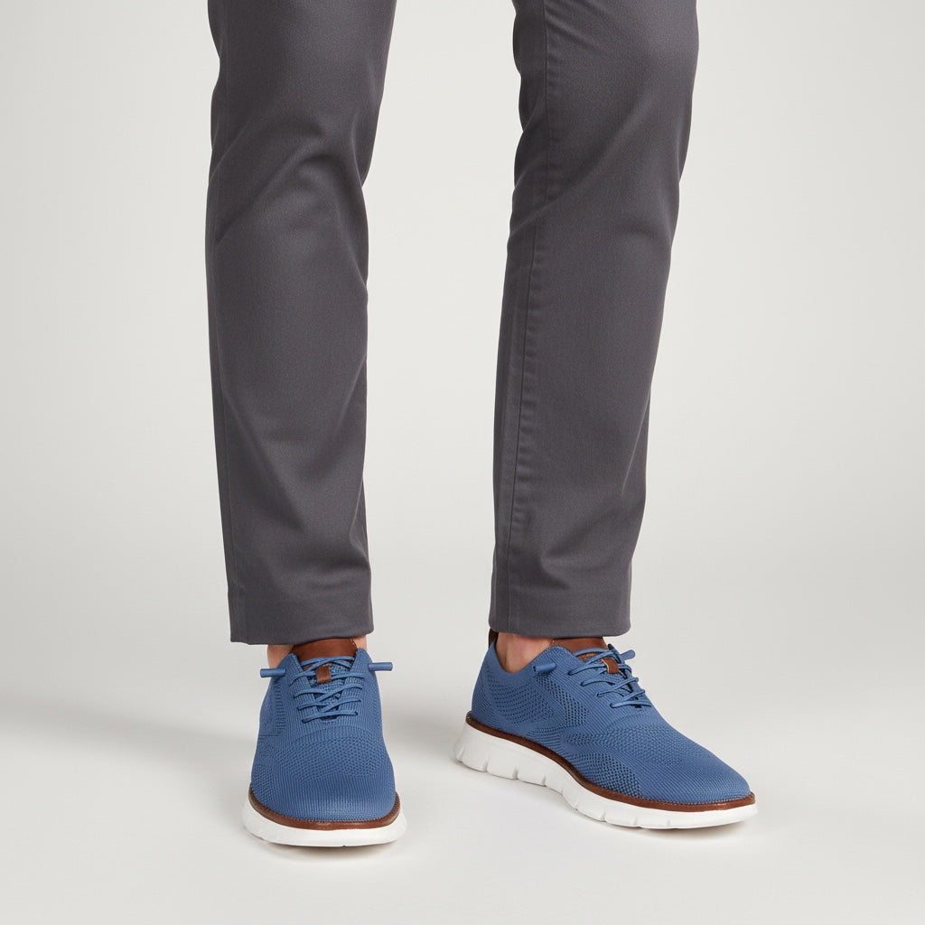Side profile of men's casual footwear, emphasizing ergonomic design and all-day comfort.