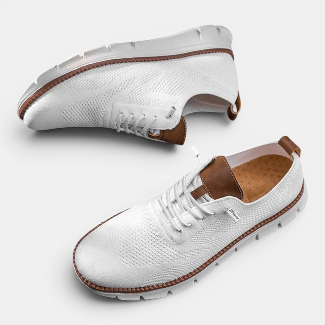 Pair of men's casual orthopedic shoes, ideal for everyday wear, offering superior foot support.
