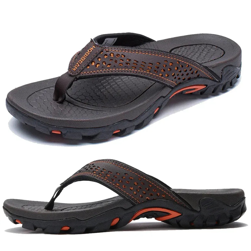 Textured sole men's flip-flops for outdoor grip and cushioned comfort. Ideal for summer travel.