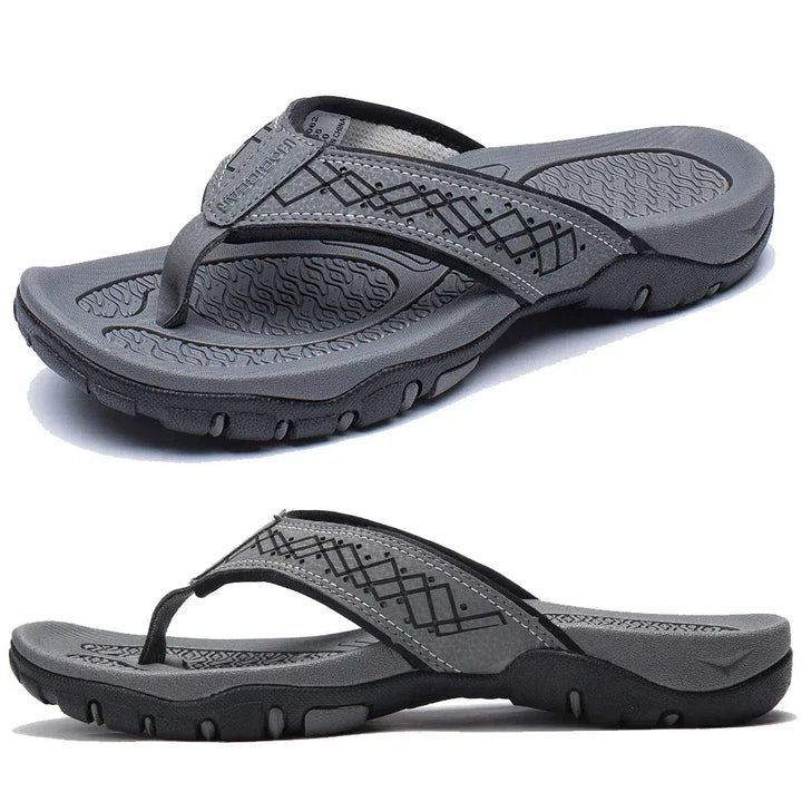 Wide strap men's outdoor sandals, cushioned for a secure fit. Textured for added style and grip.
