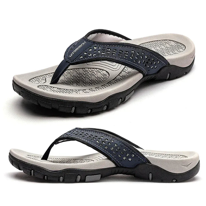 Modern men's cushioned flip-flops, textured for contemporary summer style and comfort.