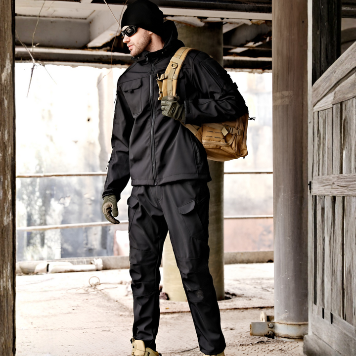 Men's durable softshell jacket & pant set for camping & outdoor adventure. Comfortable weather-resistant activewear.