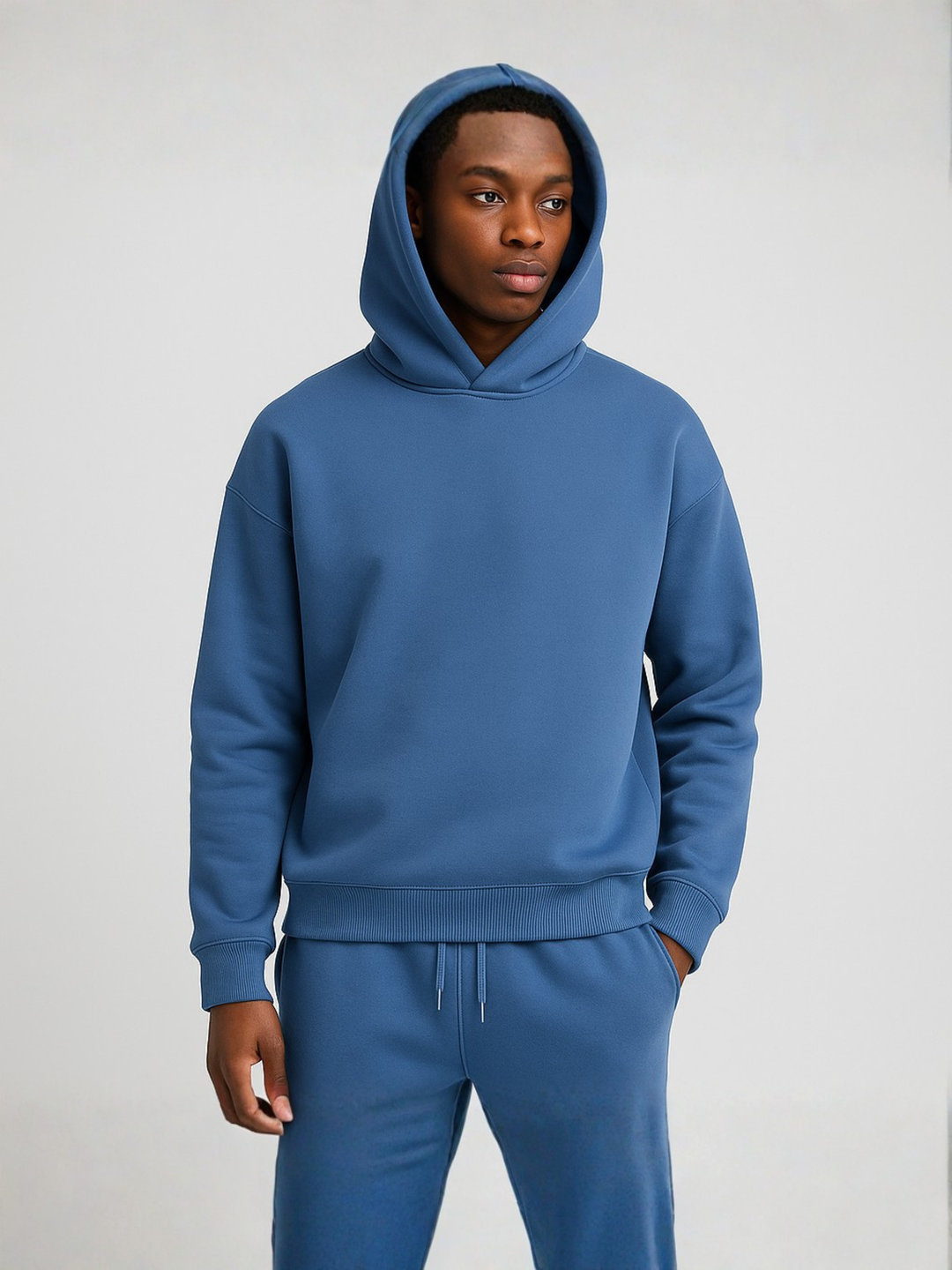 Men's oversized hoodie jogger set, relaxed fit loungewear for ultimate comfort.