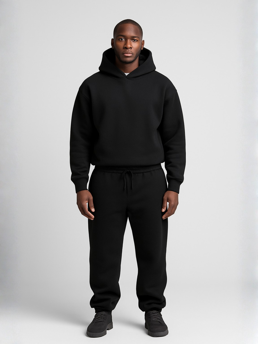 Comfortable men's oversized hoodie and jogger set, perfect for casual wear & lounging.