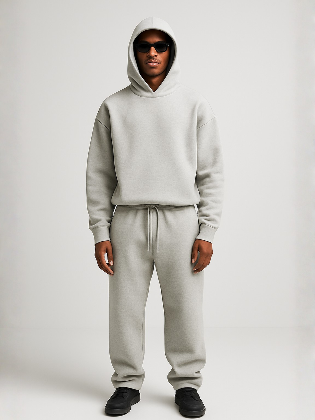 Stylish men's oversized hoodie jogger set, ideal athleisure or activewear for modern men.