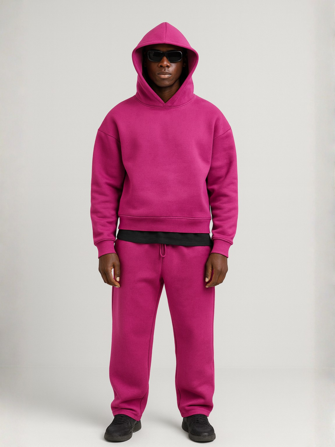 Relaxed fit two-piece men's oversized hoodie jogger set, great for travel or everyday comfort.