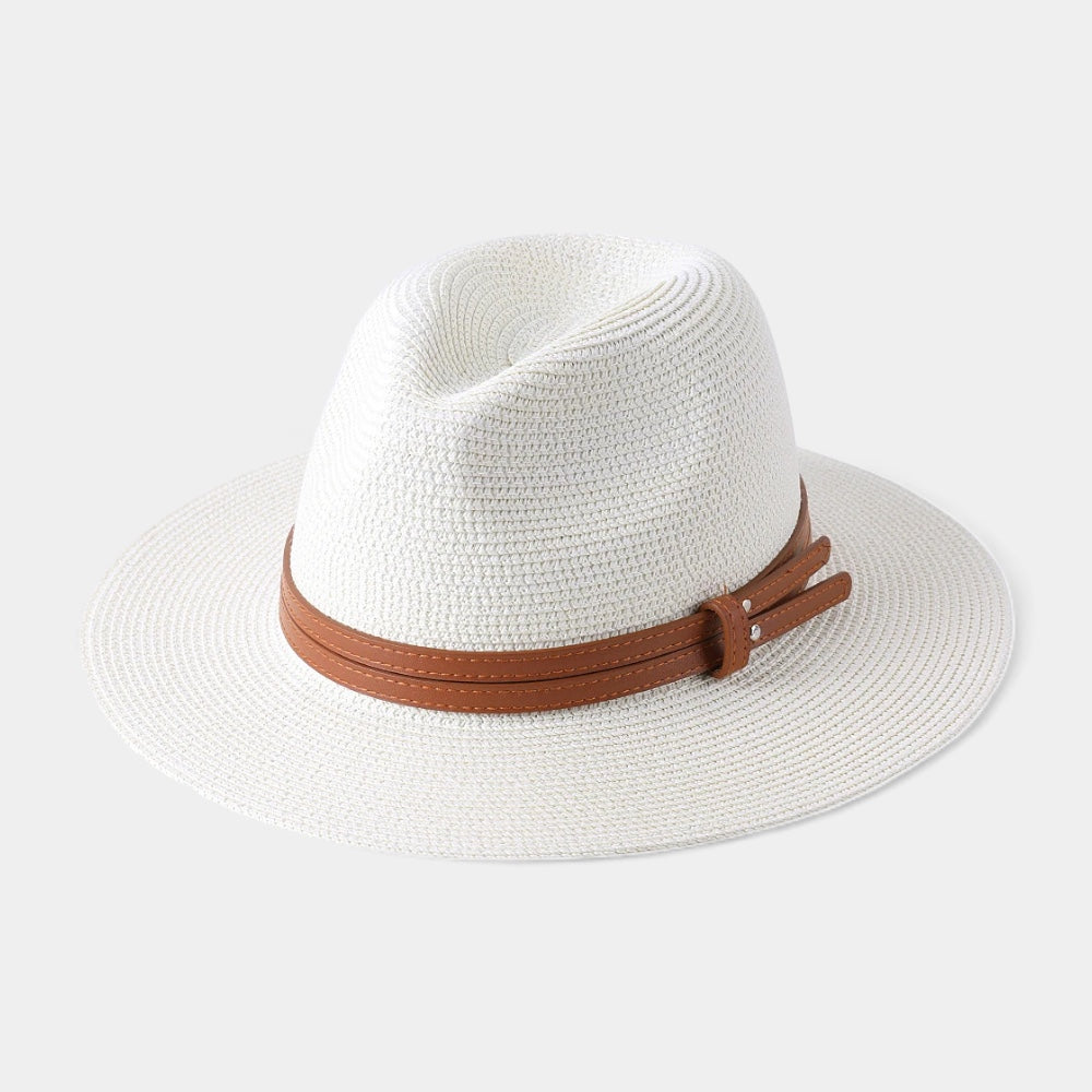 Structured men's Panama-style summer hat offering elegant sun protection, a timeless travel accessory.