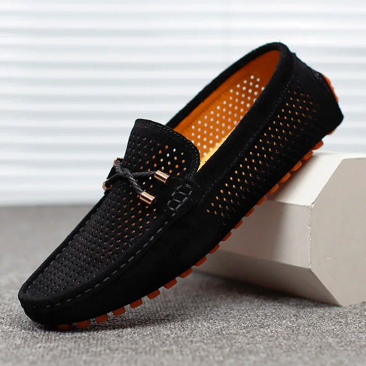 Men's beige perforated slip-on loafers, lightweight and breathable for summer comfort & elegant casual outfits.