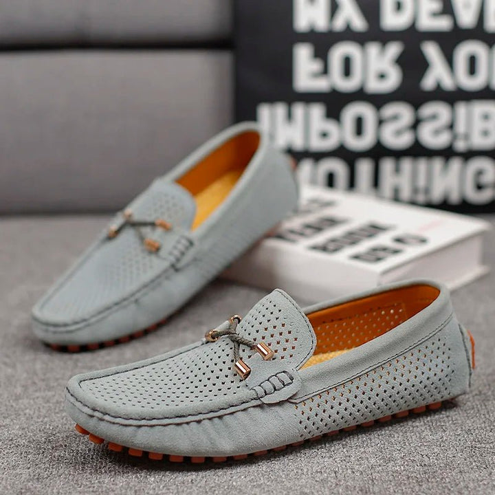 Comfortable men's perforated slip-on shoes for summer. Breathable loafers for casual elegant style.