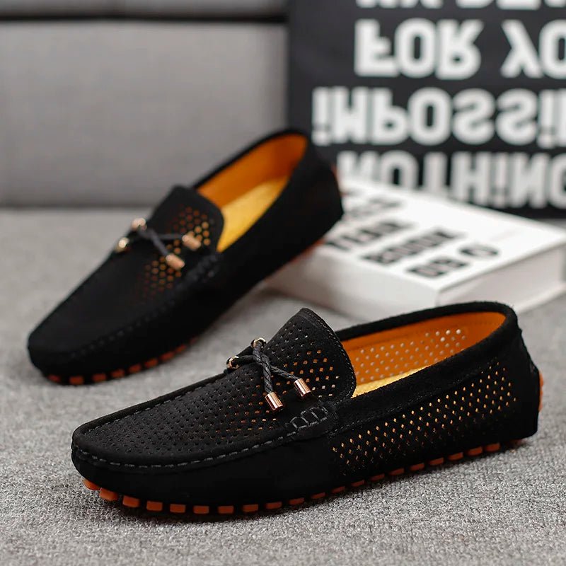 Men's modern perforated slip-on loafers, designed for ultimate breathability and summer fashion.