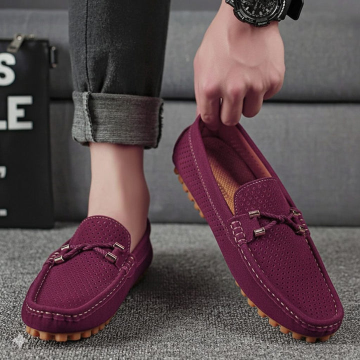 Pair of men's breathable perforated slip-on loafers, ready for comfortable casual and smart casual styling.