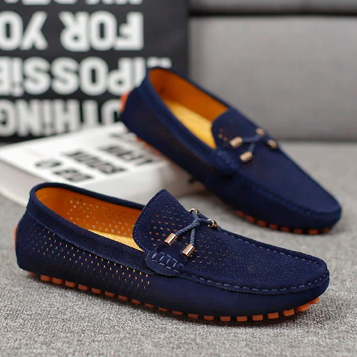 Breathable men's perforated slip-on loafers, lightweight and comfortable for all-day casual summer wear.