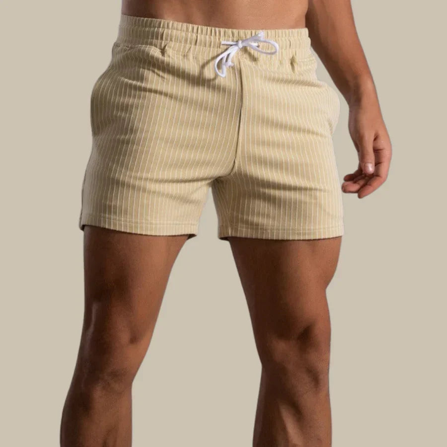 Comfortable men's stretch athletic shorts, ideal for intense fitness training & active workouts.