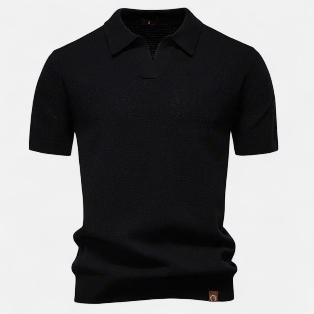 Short sleeve detail of a men's comfortable pineapple print polo shirt, perfect for warm weather fashion.