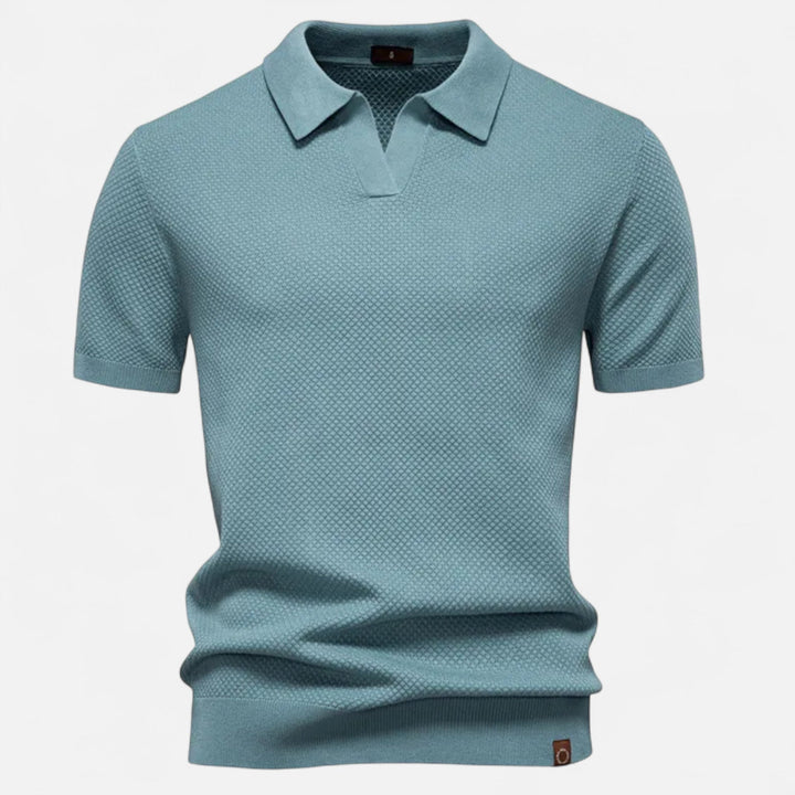 Men's stylish polo shirt with a unique pineapple print, offering comfortable and classic summer wear.
