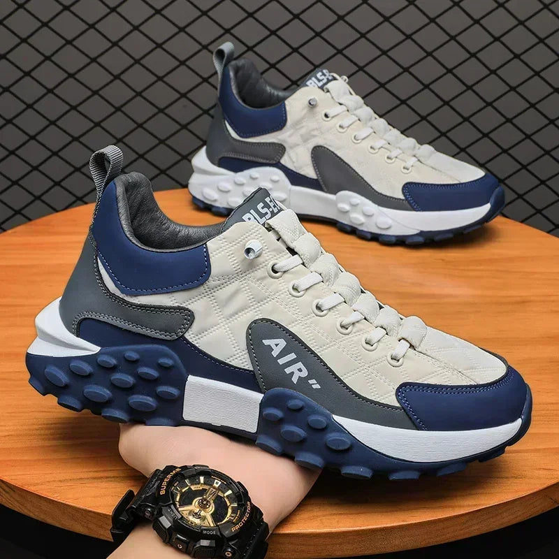 Athletic men's platform trainers featuring a chunky sole, combining street style with comfort.