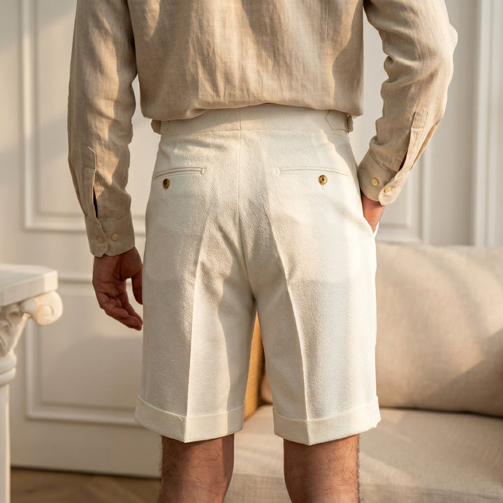 Stylish men's pleated gurkha shorts with a relaxed fit. Ideal smart casual bottoms for summer fashion and comfort.