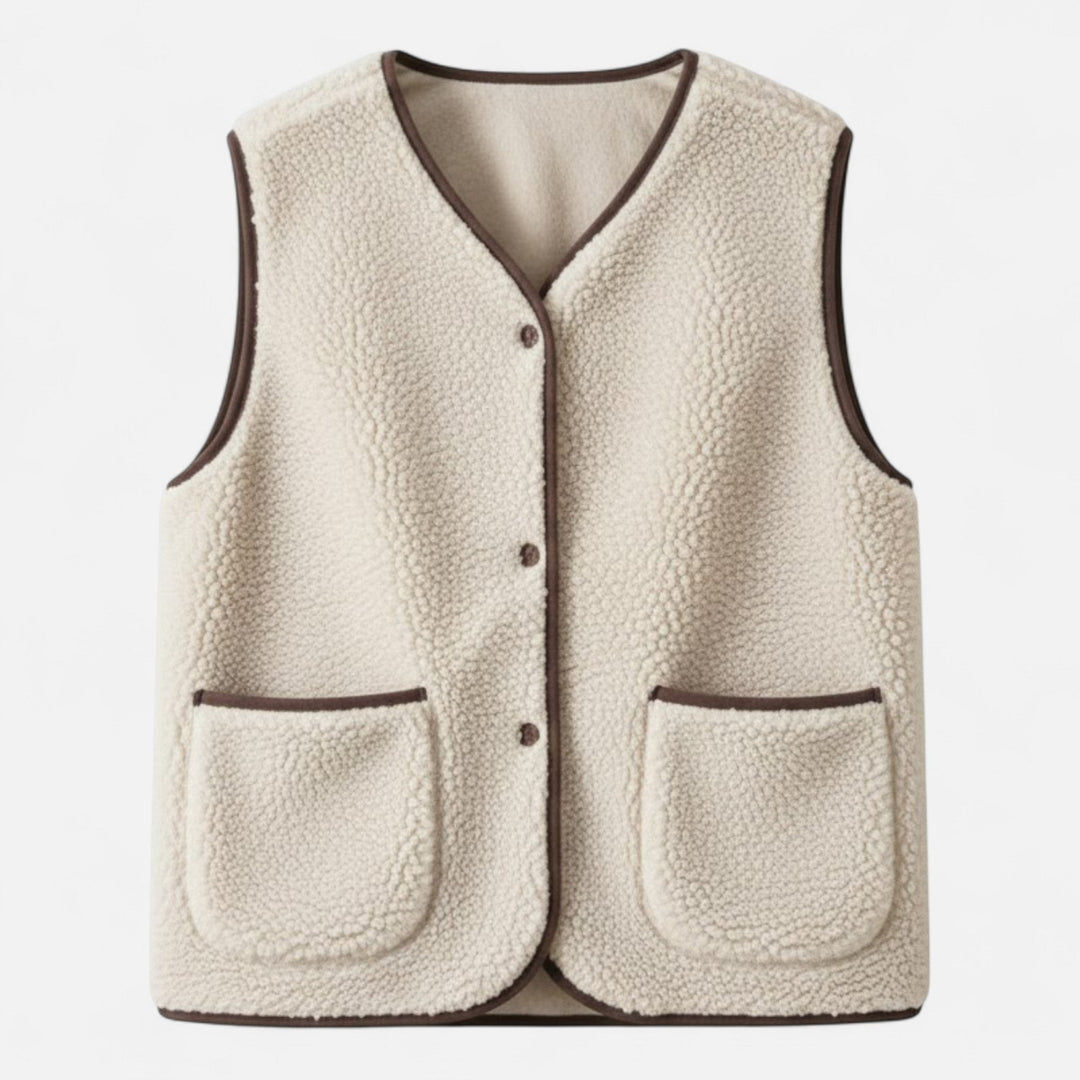 Men's plush knit vest, cashmere-style for refined layering. Comfortable sleeveless design with buttons.