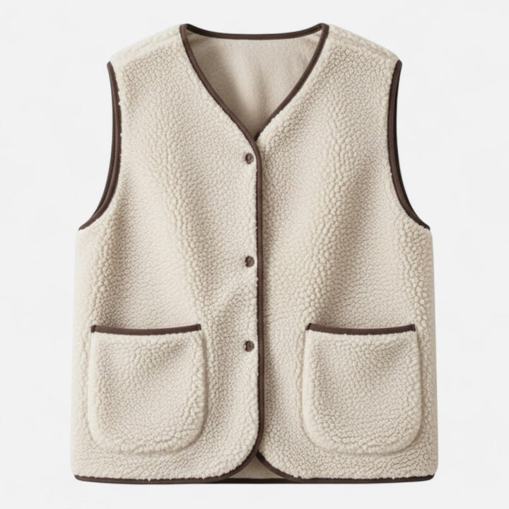 Men's plush knit vest, cashmere-style for refined layering. Comfortable sleeveless design with buttons.