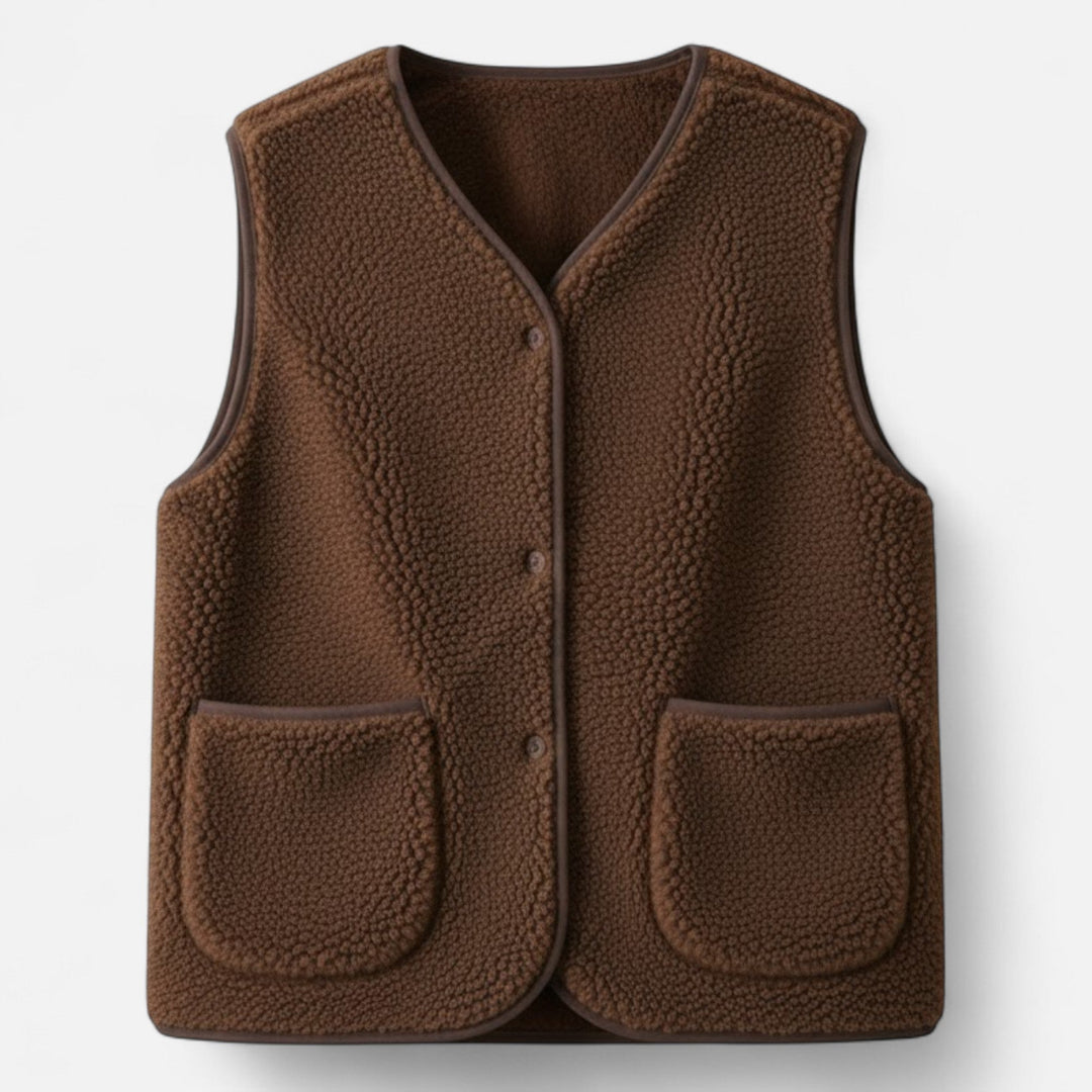 Button-front men's plush knit vest. Versatile cashmere-style layering piece for a refined and comfortable look.