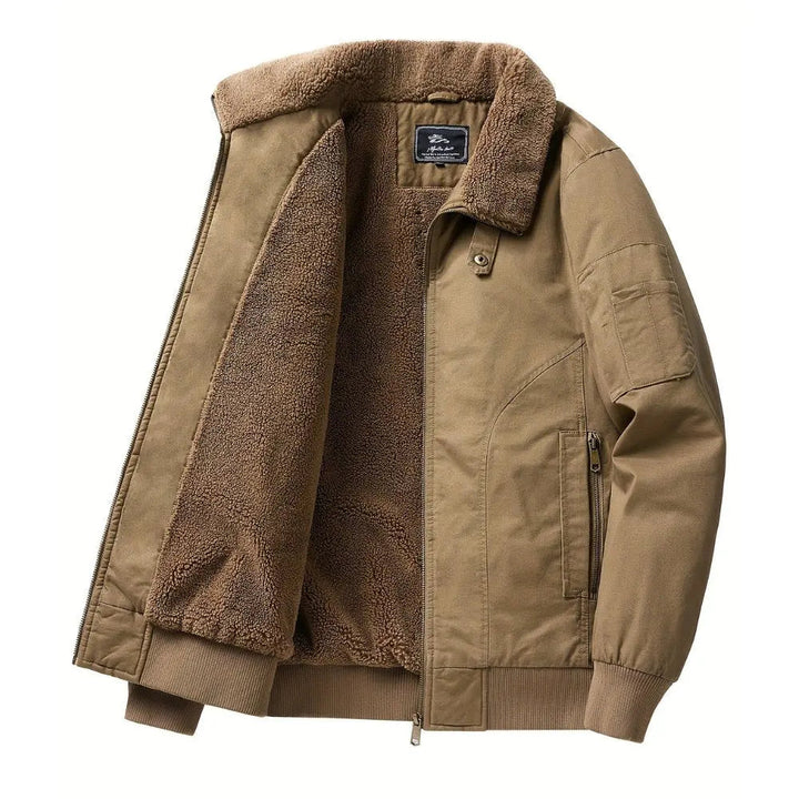 Casual men's brown bomber jacket with plush Sherpa collar and zip front, designed for warmth and urban fall fashion.