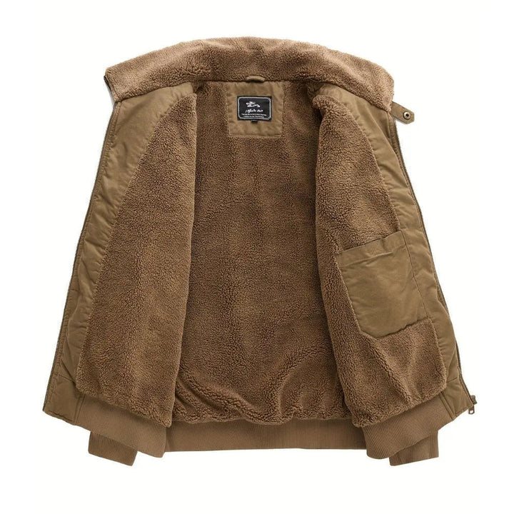 Detailed view of men's bomber jacket with a luxurious plush Sherpa collar and sturdy zip front, cozy winter fashion.