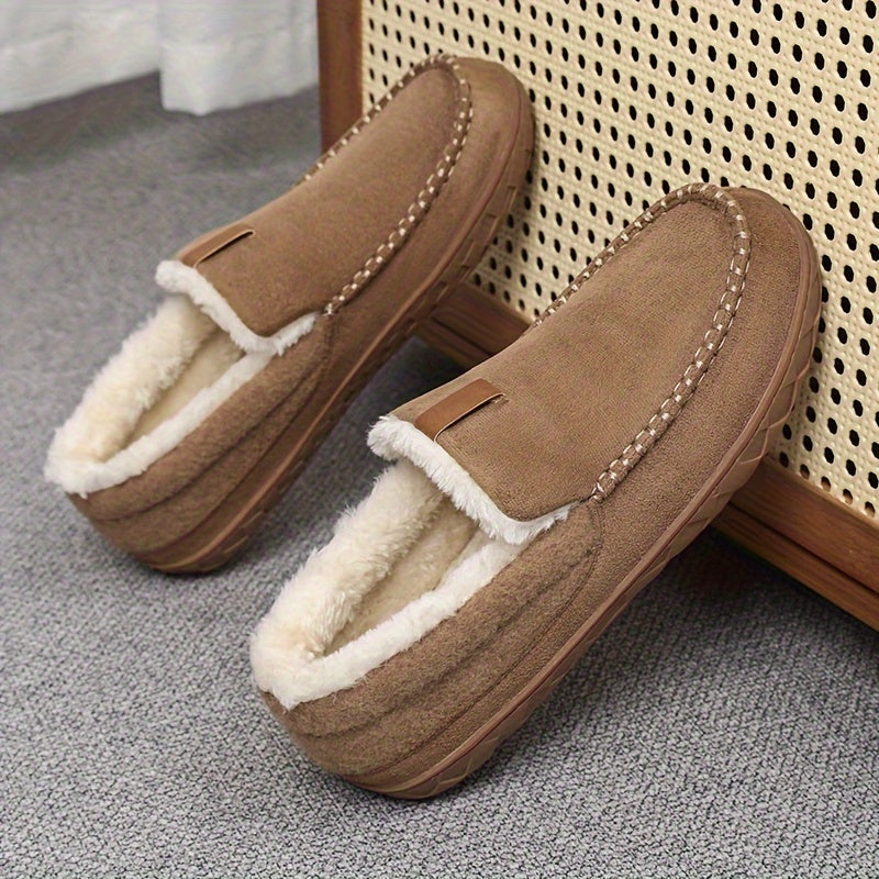 Plush men's warm slippers featuring soft sheepskin lining and a durable non-slip sole for indoor safety.