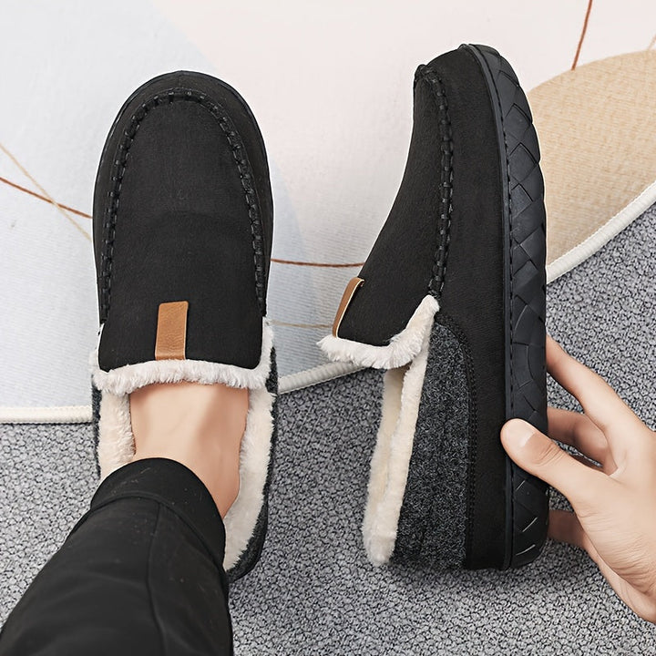 Cozy men's house slippers with warm sheepskin lining & non-slip sole, perfect for relaxation & winter comfort.