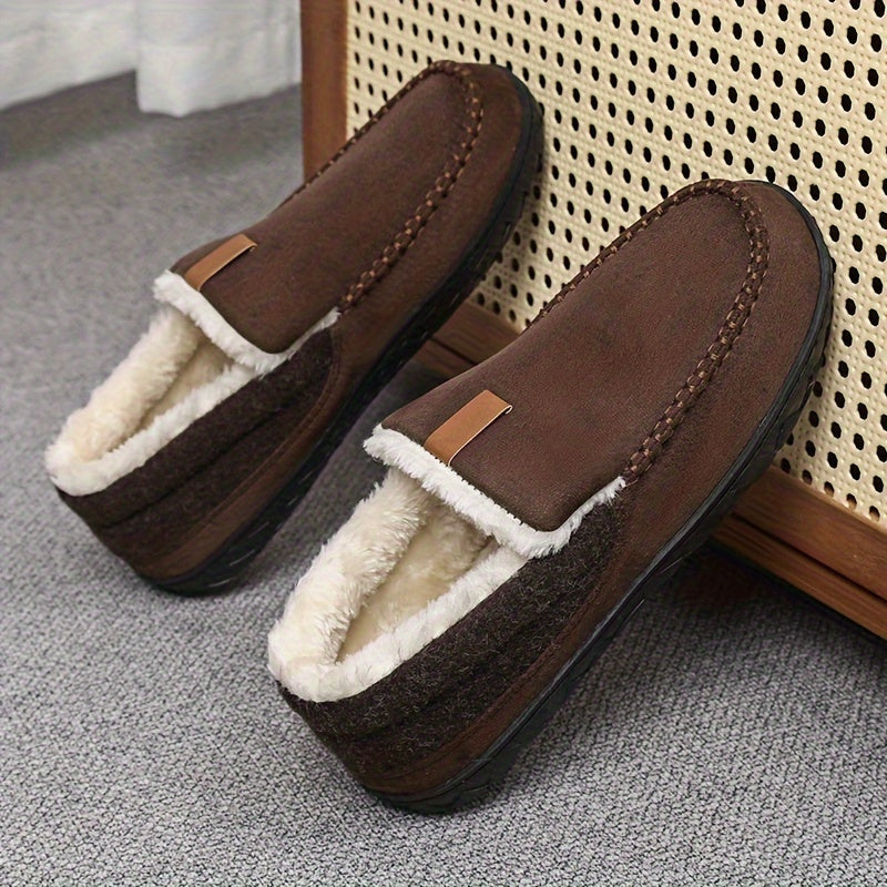 Warm men's comfort slippers with luxurious sheepskin lining, plush exterior, and secure non-slip sole.