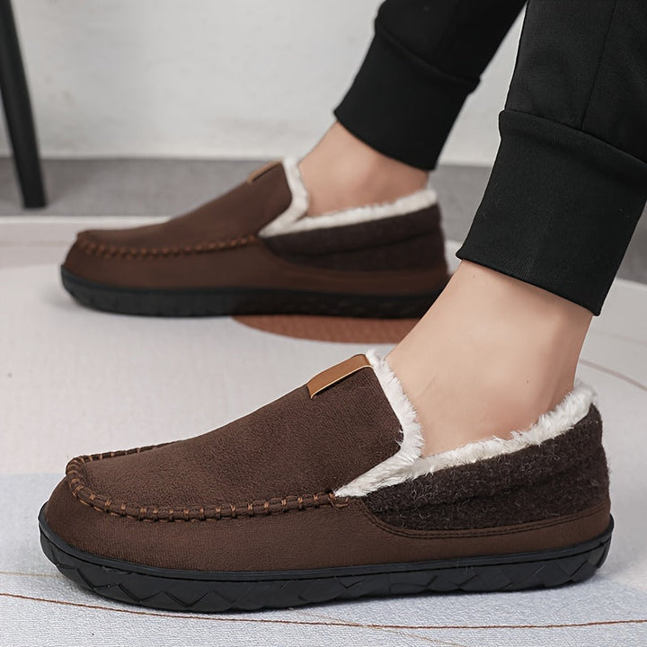 Relaxing men's house shoes, super plush & warm with sheepskin lining, ensuring cozy steps on non-slip sole.