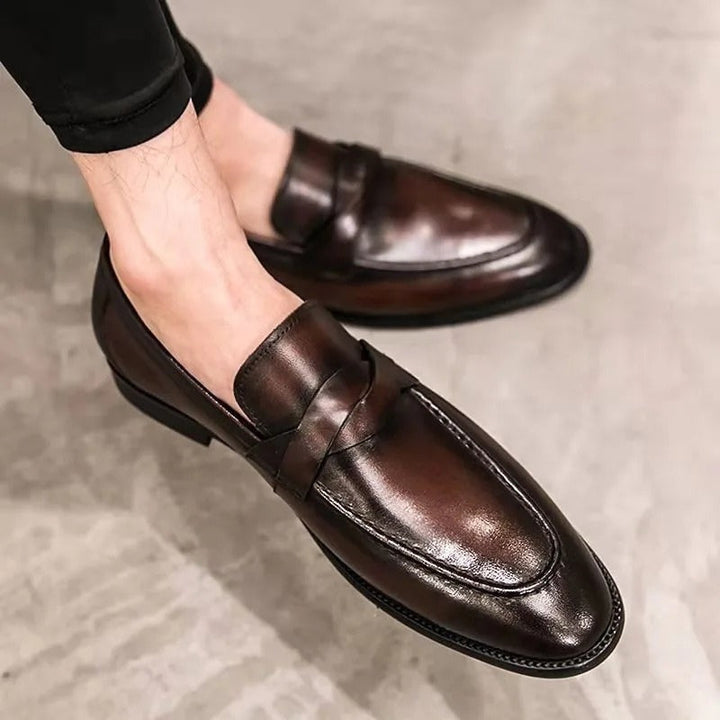 Stylish men's polished penny loafers. Comfortable slip-on formal shoes perfect for work or smart casual events.