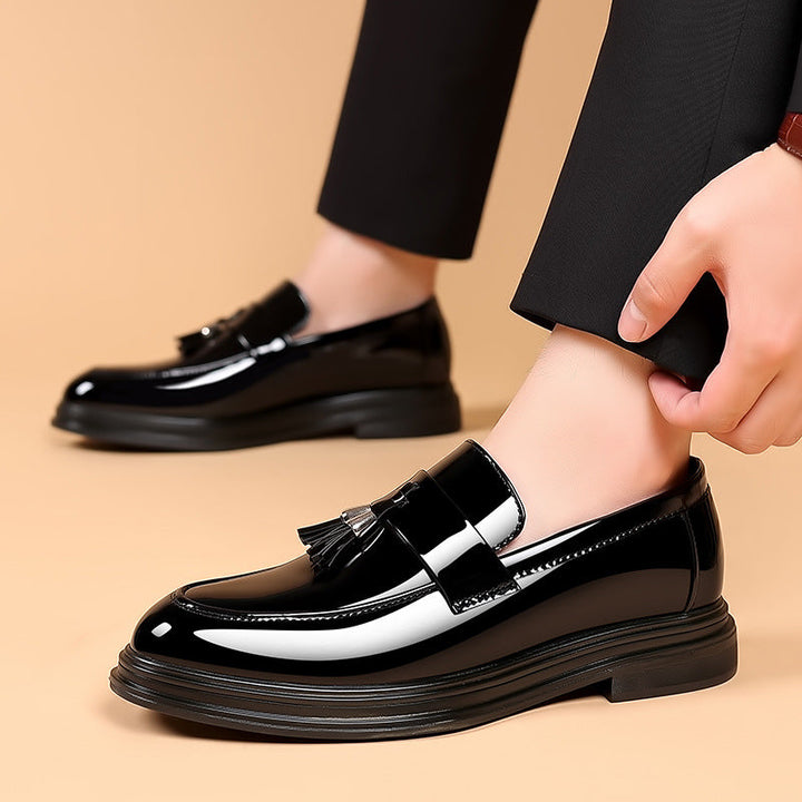 Sophisticated men's polished leather tassel loafers, a smart casual & formal footwear choice.