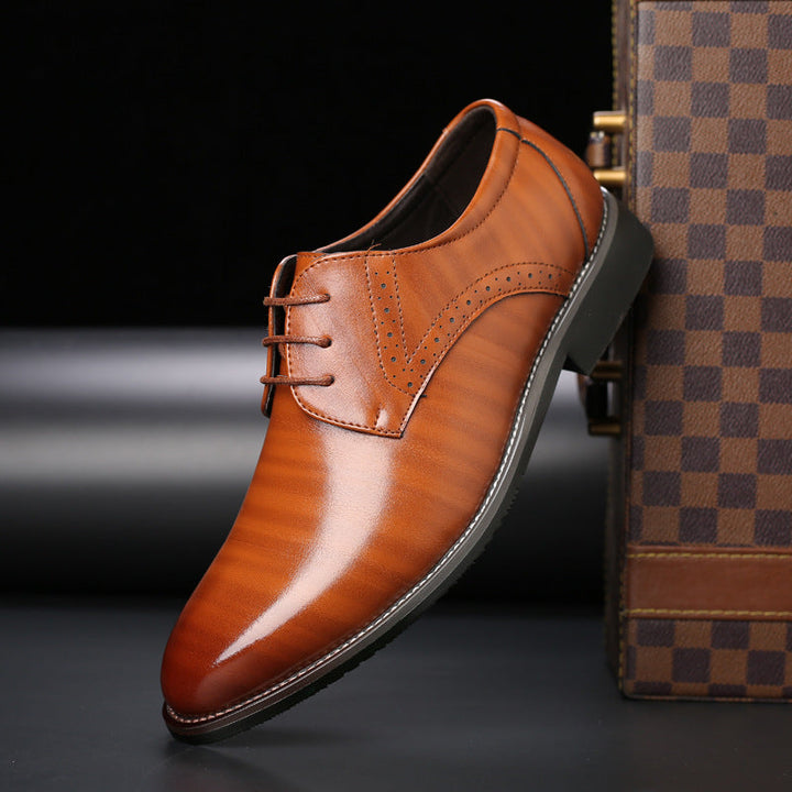 High-quality men's polished brogue formal shoes in black, featuring a comfortable lace-up design for long events.
