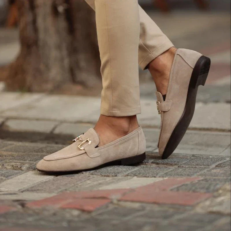 Stylish men's brown polished leather slip-on loafers with gold horsebit detail, perfect for spring summer fashion.