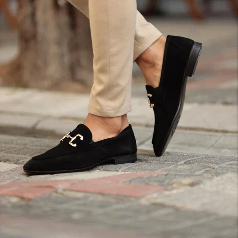 Refined men's slip-on horsebit loafers in high-shine leather. Classic design for versatile formal and casual style.