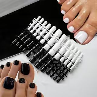 Men's press-on toenail kit with sleek black false nails for a stylish, instant pedicure. Men's grooming solution.