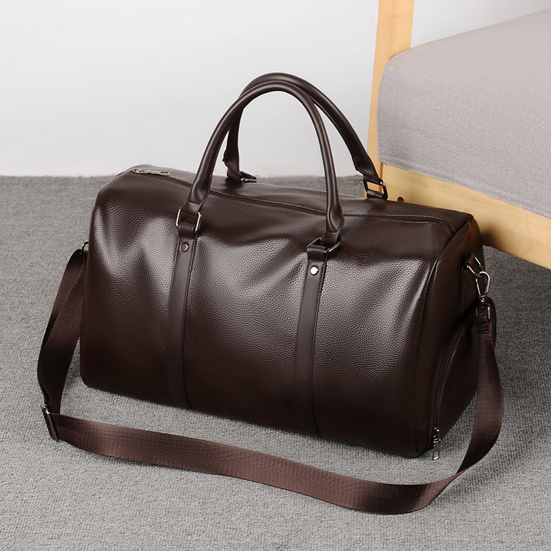 Men's premium brown leather weekend duffle bag, ideal for stylish travel & overnight trips.