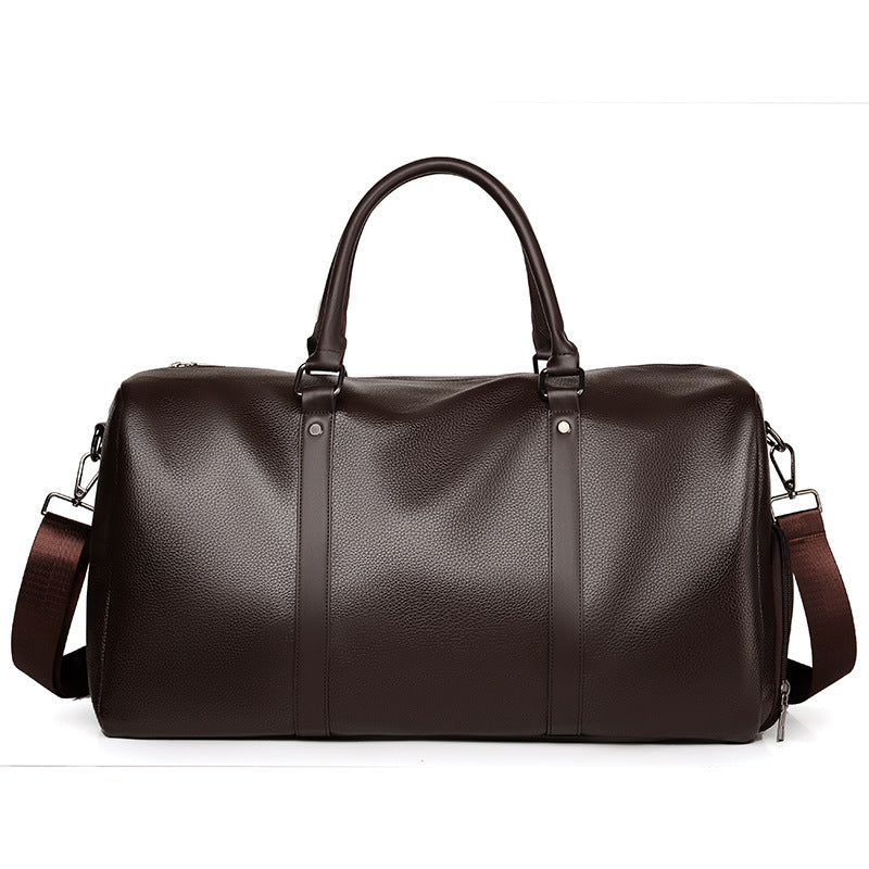 Elegant men's brown leather travel duffle, a perfect carry-on for short trips & stylish journeys.