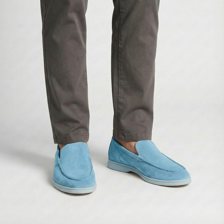 Man walking in comfortable men's slip-on loafers, demonstrating ease & everyday style.