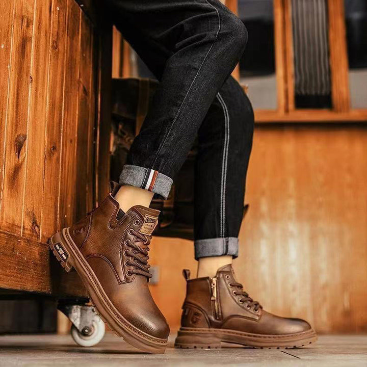 Close-up of premium leather texture on men's brown slip-on work boots, anti-slip, comfortable.