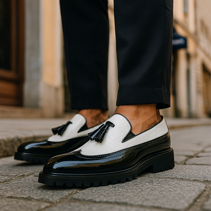 High-quality men's tassel loafers with a sleek croc-embossed finish. Comfortable slip-on luxury footwear.