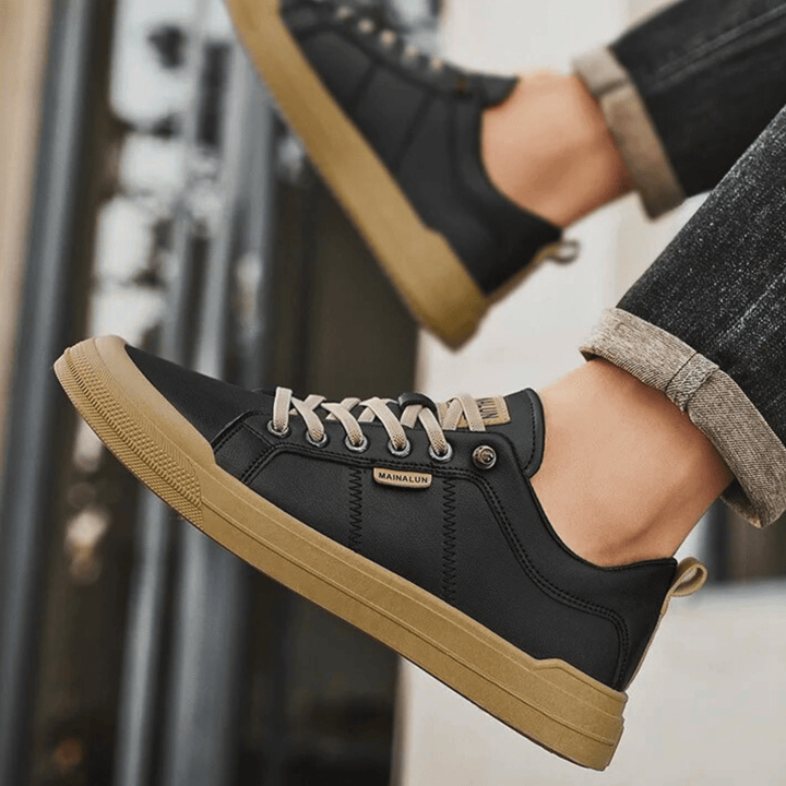 Premium men's comfortable low-top sneakers, ideal everyday shoes for a sleek, athletic casual look.