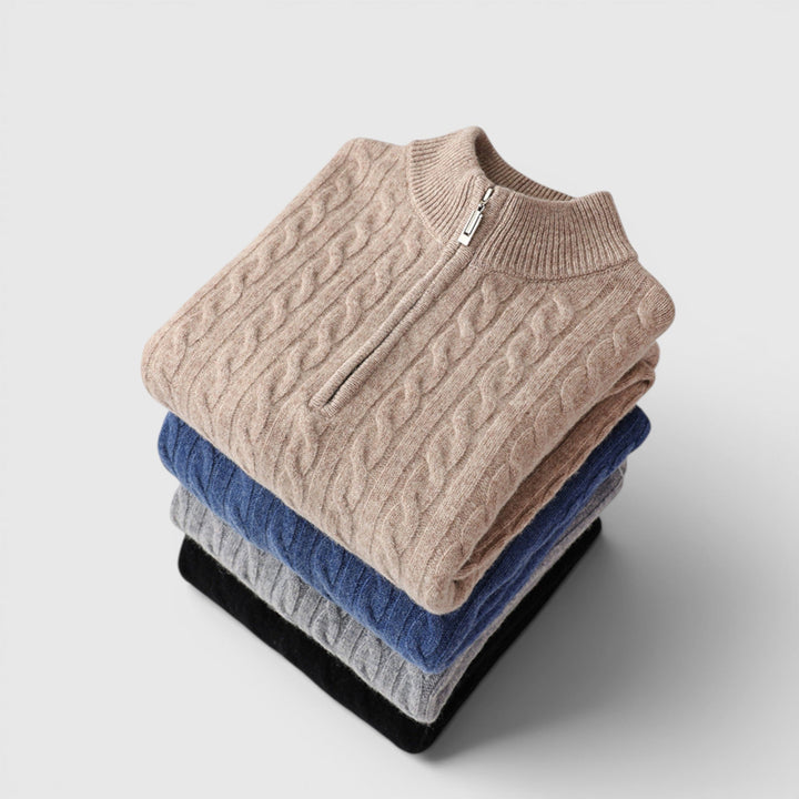 Close-up of soft knit on men's half zip pullover sweater, highlighting warmth & quality.